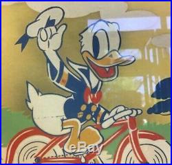 Vintage Walt Disney Productions Donald Duck Riding Bike Framed Collector Item